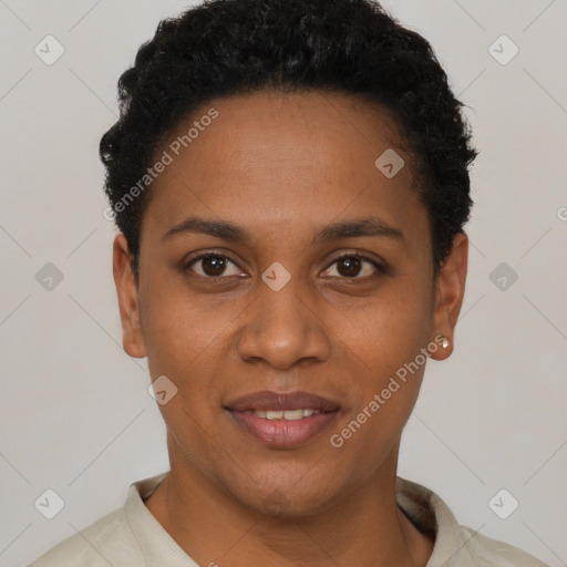 Joyful black young-adult female with short  black hair and brown eyes