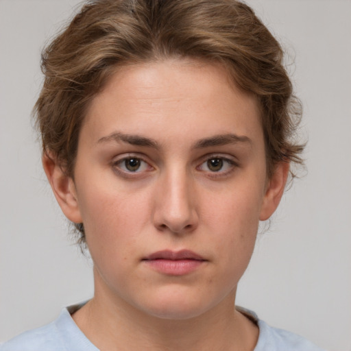 Neutral white young-adult female with short  brown hair and brown eyes