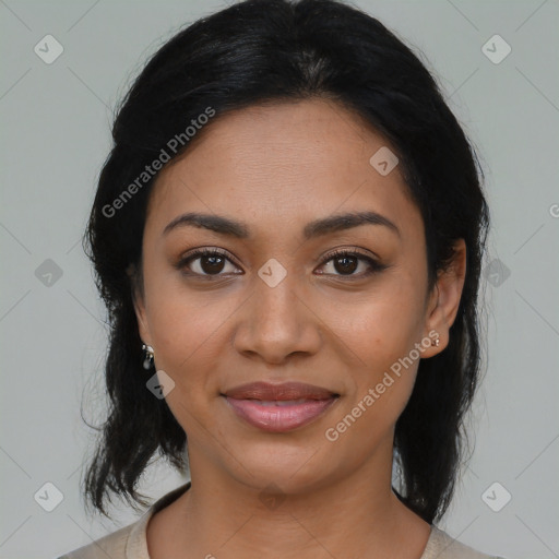 Joyful latino young-adult female with medium  black hair and brown eyes