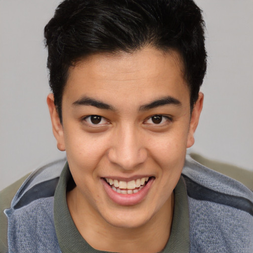 Joyful asian young-adult male with short  brown hair and brown eyes