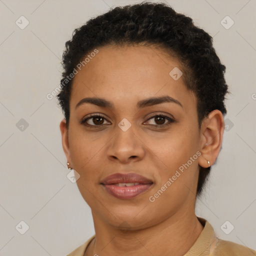 Joyful latino young-adult female with short  black hair and brown eyes