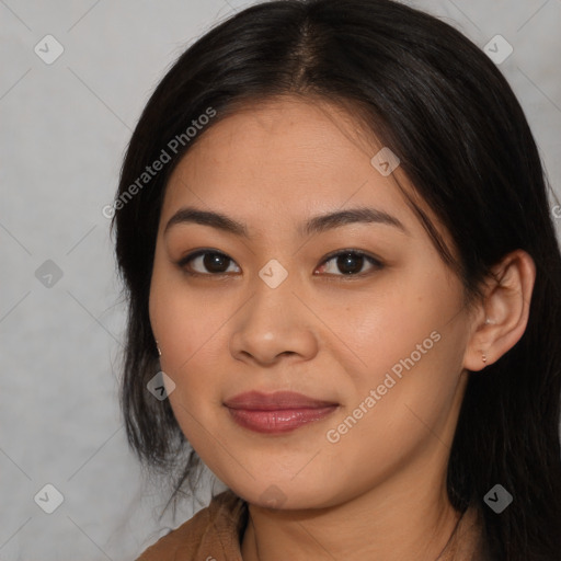 Joyful asian young-adult female with long  brown hair and brown eyes