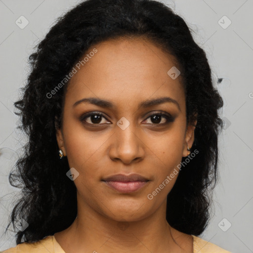 Joyful black young-adult female with long  black hair and brown eyes