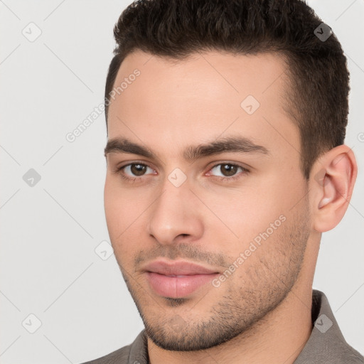 Neutral white young-adult male with short  brown hair and brown eyes