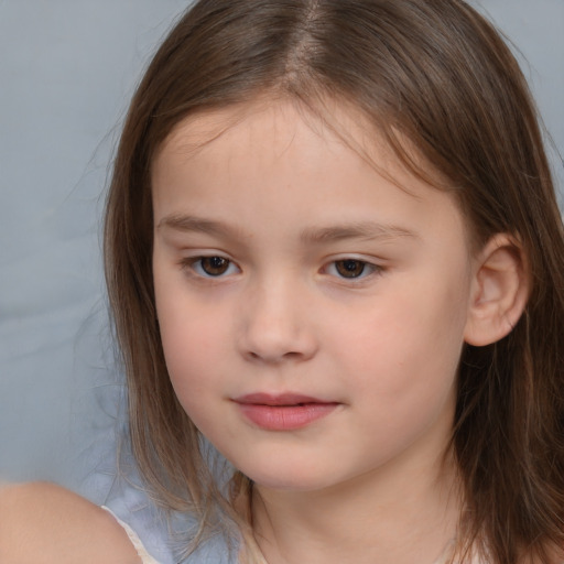 Neutral white child female with medium  brown hair and brown eyes