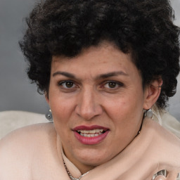 Joyful white adult female with short  brown hair and brown eyes