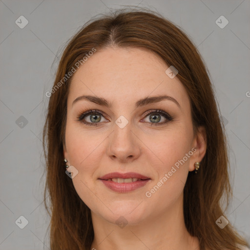 Joyful white young-adult female with long  brown hair and green eyes