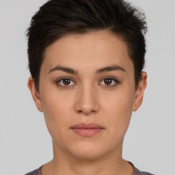 Neutral white young-adult female with short  brown hair and brown eyes