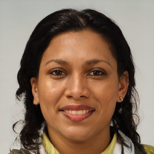 Joyful black young-adult female with medium  brown hair and brown eyes