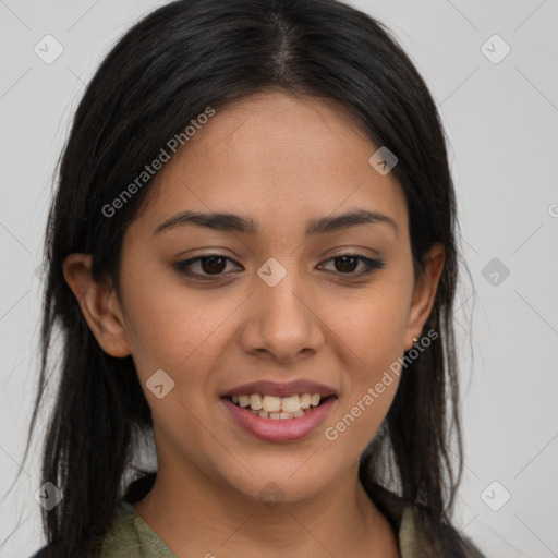 Joyful latino young-adult female with long  brown hair and brown eyes