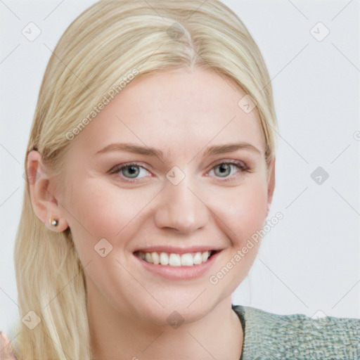 Joyful white young-adult female with medium  brown hair and blue eyes