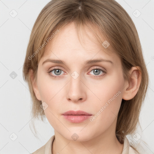 Neutral white young-adult female with medium  brown hair and grey eyes