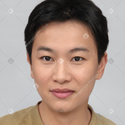 Joyful asian young-adult male with short  brown hair and brown eyes