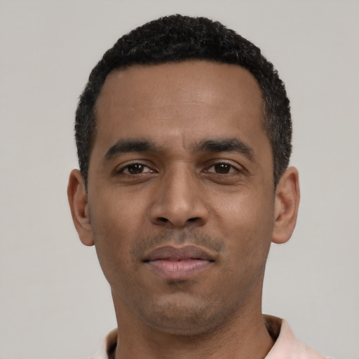 Neutral black young-adult male with short  black hair and brown eyes