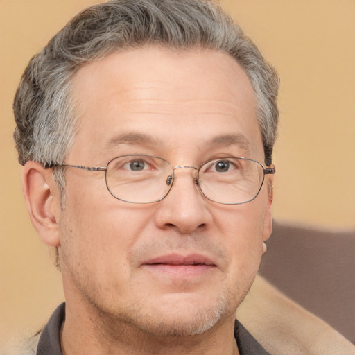 Joyful white middle-aged male with short  brown hair and brown eyes