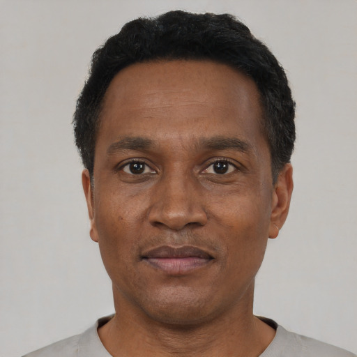 Neutral black adult male with short  black hair and brown eyes