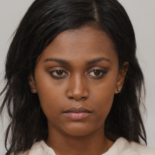 Neutral asian young-adult female with medium  brown hair and brown eyes