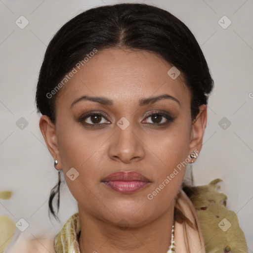 Joyful latino young-adult female with medium  brown hair and brown eyes