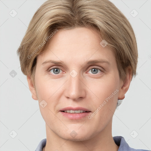 Joyful white young-adult female with short  brown hair and grey eyes