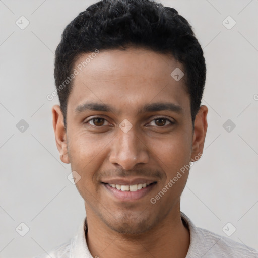 Joyful latino young-adult male with short  black hair and brown eyes