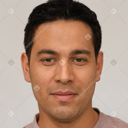 Joyful white young-adult male with short  black hair and brown eyes