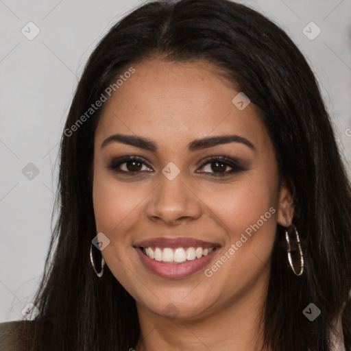 Joyful latino young-adult female with long  brown hair and brown eyes