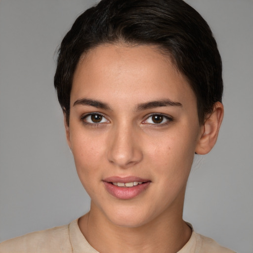 Joyful white young-adult female with short  brown hair and brown eyes