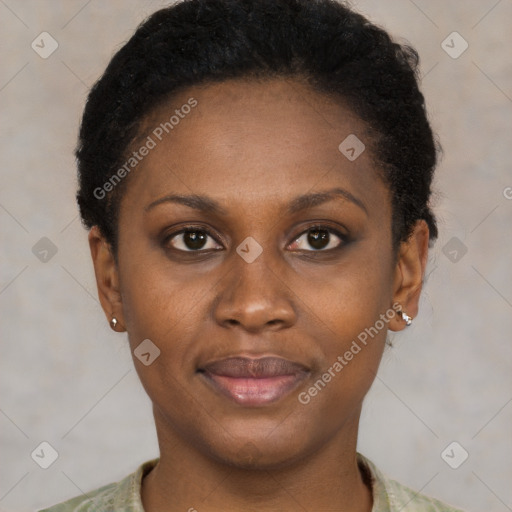 Joyful black young-adult female with short  brown hair and brown eyes