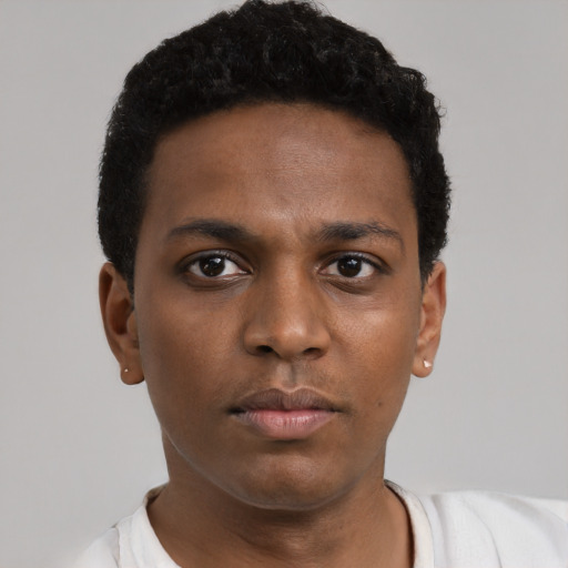 Neutral black young-adult male with short  black hair and brown eyes