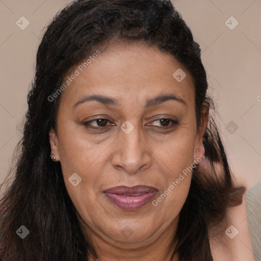 Joyful white adult female with long  brown hair and brown eyes