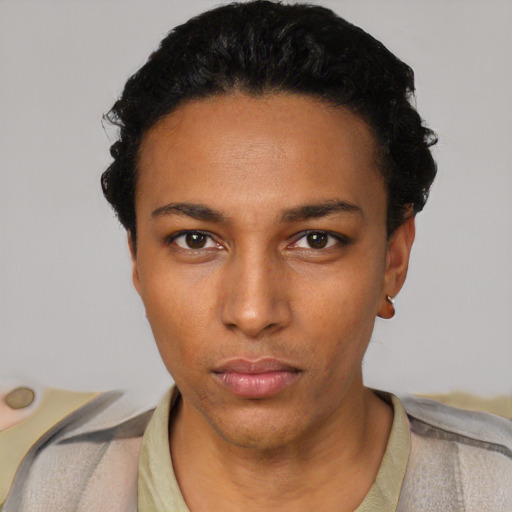Neutral white young-adult female with short  black hair and brown eyes