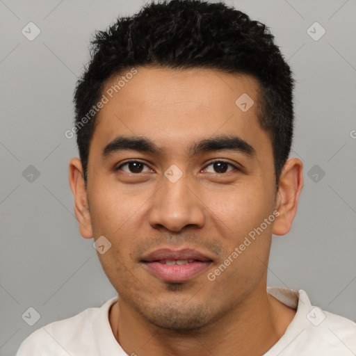 Joyful latino young-adult male with short  black hair and brown eyes