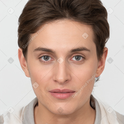 Joyful white young-adult female with short  brown hair and grey eyes