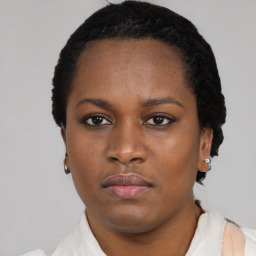 Neutral black young-adult female with short  black hair and brown eyes
