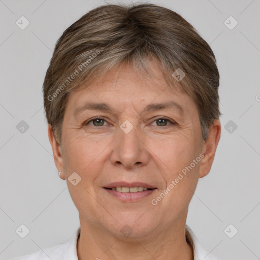 Joyful white adult female with short  brown hair and brown eyes