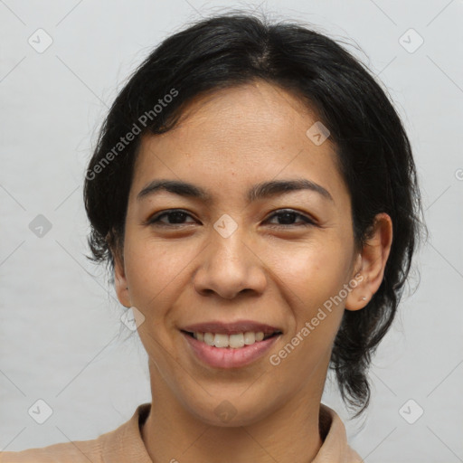 Joyful latino young-adult female with medium  brown hair and brown eyes