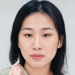 Neutral asian young-adult female with medium  brown hair and brown eyes