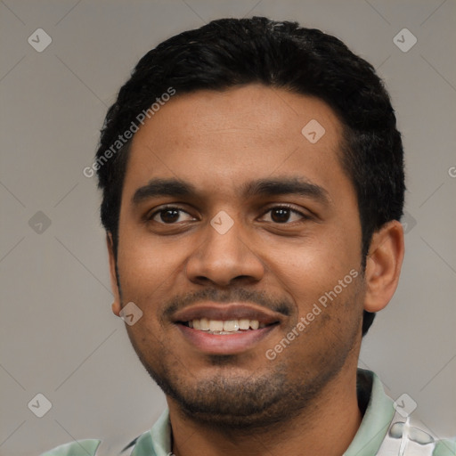 Joyful latino young-adult male with short  black hair and brown eyes