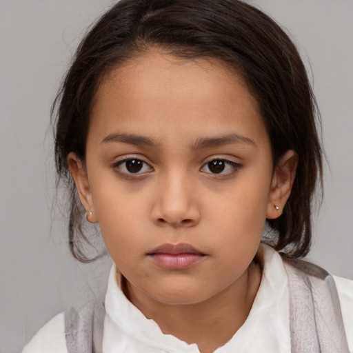 Neutral white child female with medium  brown hair and brown eyes