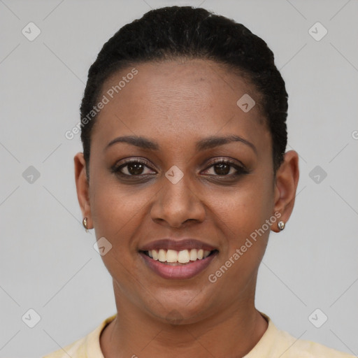 Joyful black young-adult female with short  black hair and brown eyes