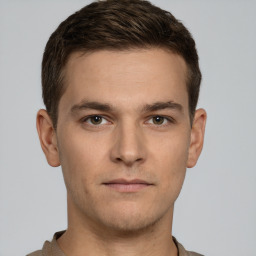 Neutral white young-adult male with short  brown hair and grey eyes