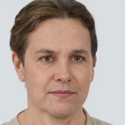 Joyful white adult male with short  brown hair and grey eyes