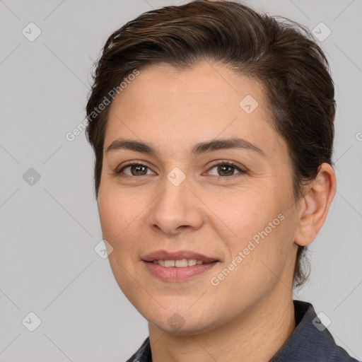 Joyful white young-adult female with short  brown hair and brown eyes