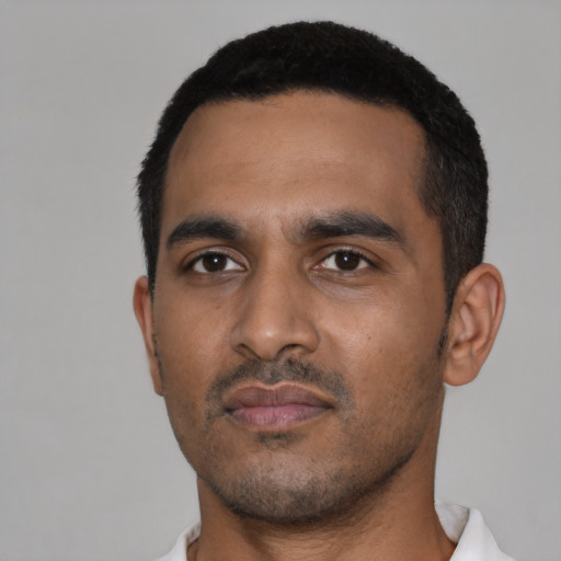 Neutral black young-adult male with short  black hair and brown eyes
