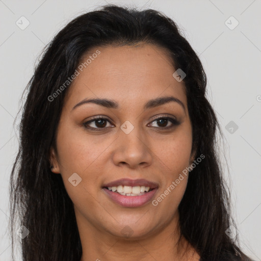 Joyful latino young-adult female with long  brown hair and brown eyes