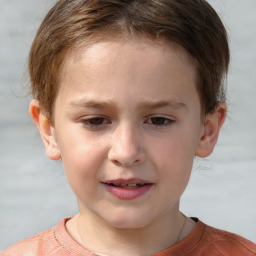 Joyful white child female with short  brown hair and grey eyes