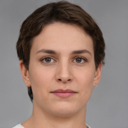 Neutral white young-adult female with short  brown hair and brown eyes