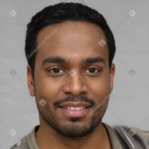 Joyful black young-adult male with short  black hair and brown eyes