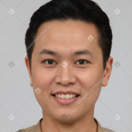 Joyful white young-adult male with short  brown hair and brown eyes