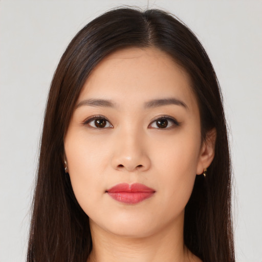 Neutral asian young-adult female with long  brown hair and brown eyes